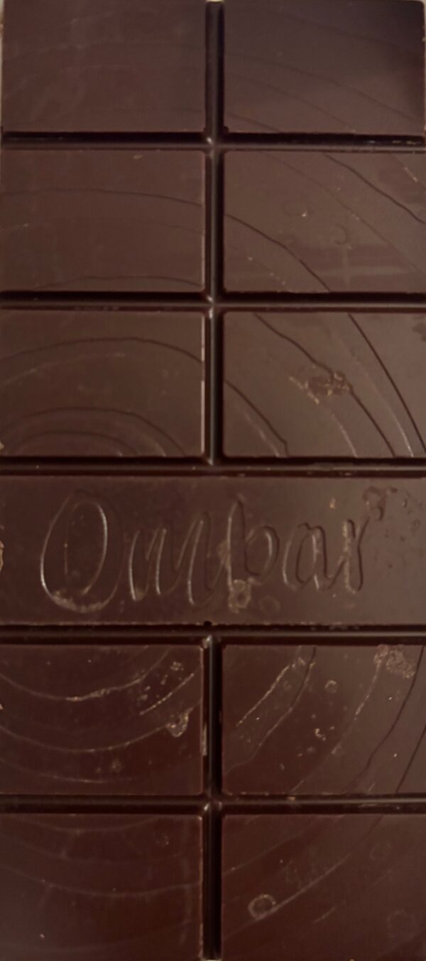 Unwrapped Ombar 72% Back. Chocolate bar split into 11 pieces with the words 'Ombar' imprinted